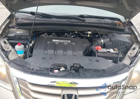 2010 Honda Odyssey Lx z USA, uszkodzony, nr VIN 5FNRL3H29AB009627